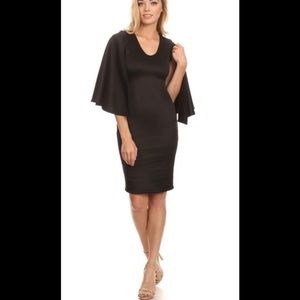 Black silhouette style dress with back cape.
